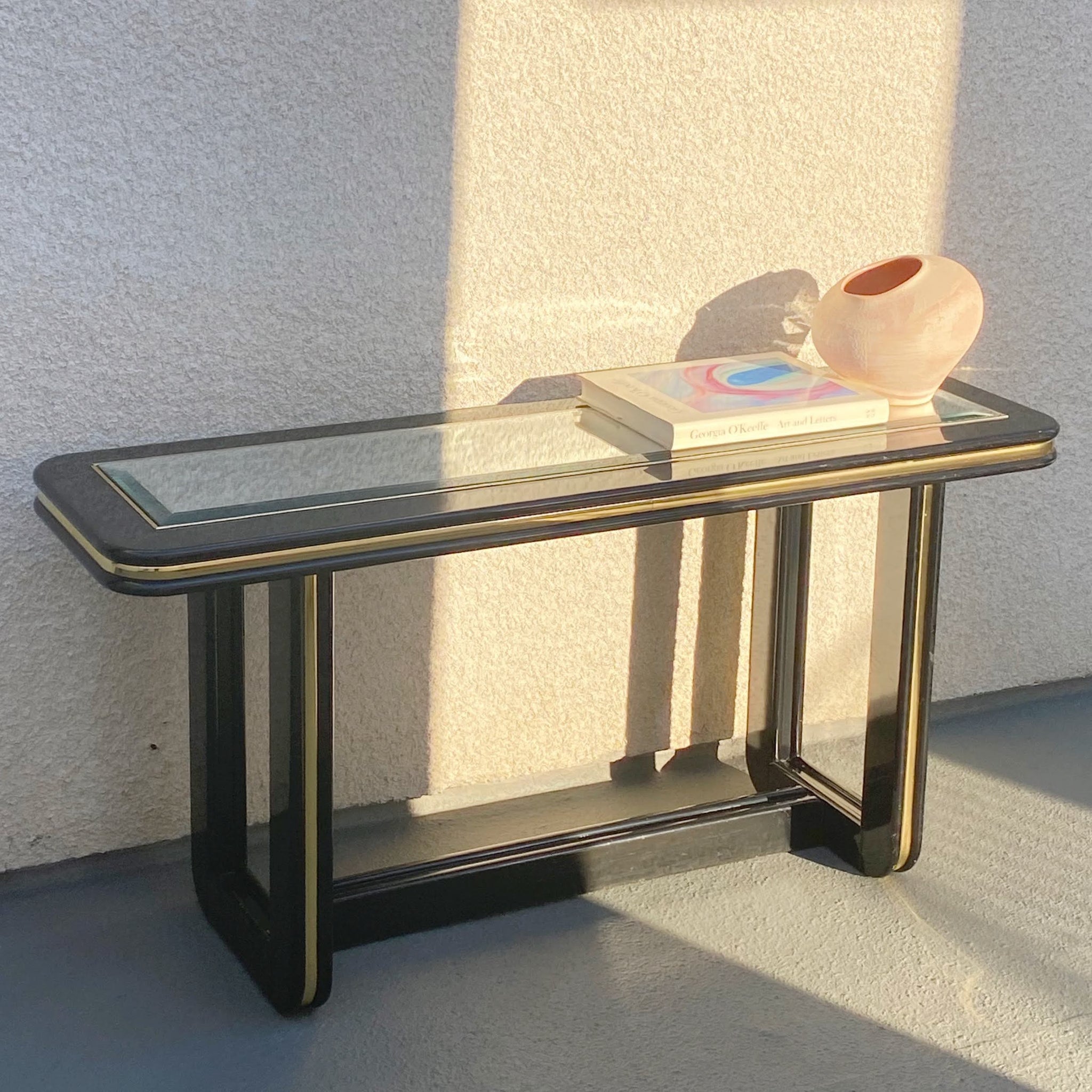 vintage 1980s black lacquer console table with mirrored top