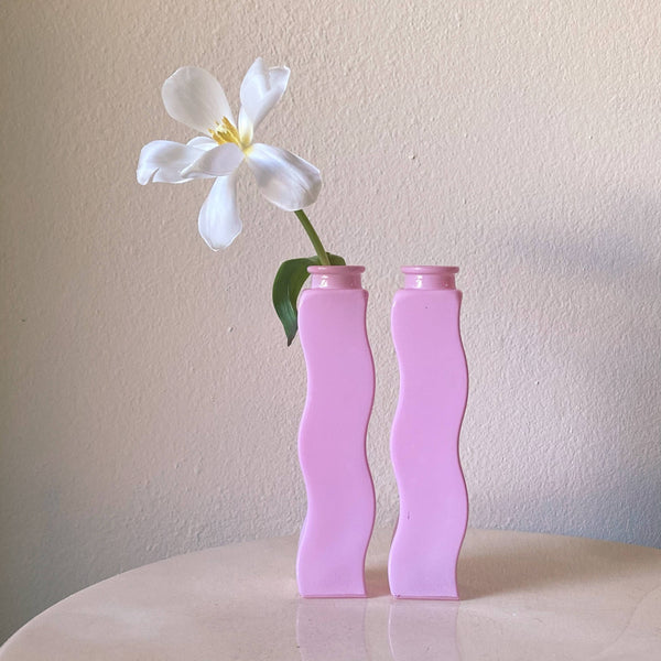 pink wavy glass bud vase