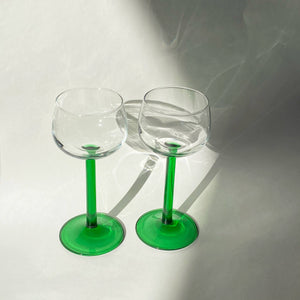 pair of vintage luminarc emerald green stem glasses