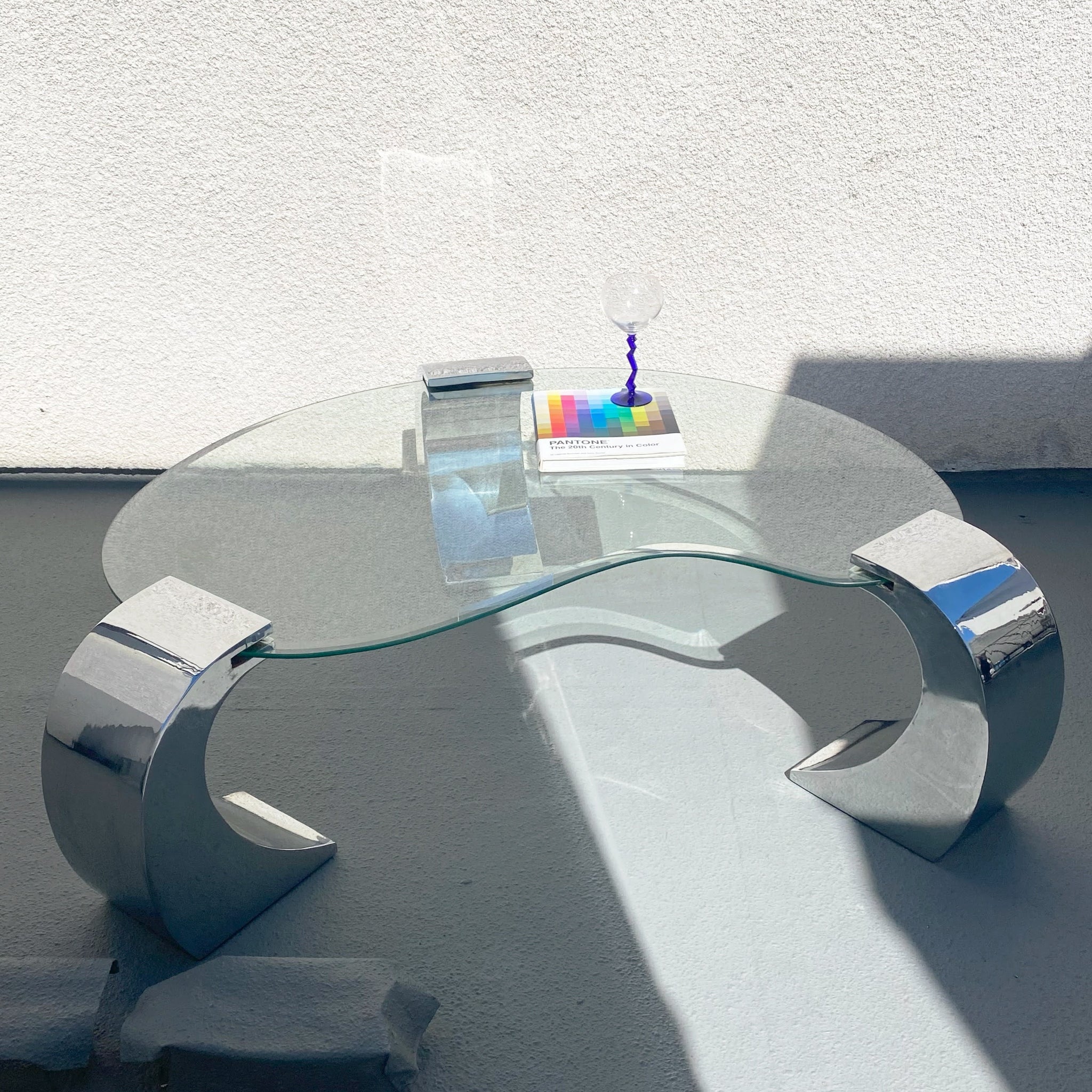 kidney glass and chrome coffee table