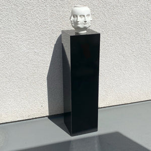 black laminate pedestal stand