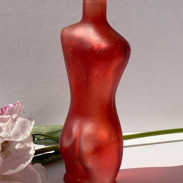 red glass femme figure bud vase