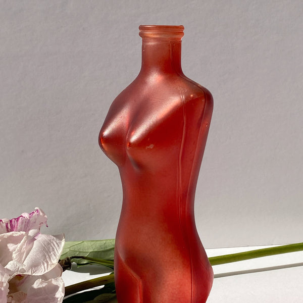 red glass femme figure bud vase